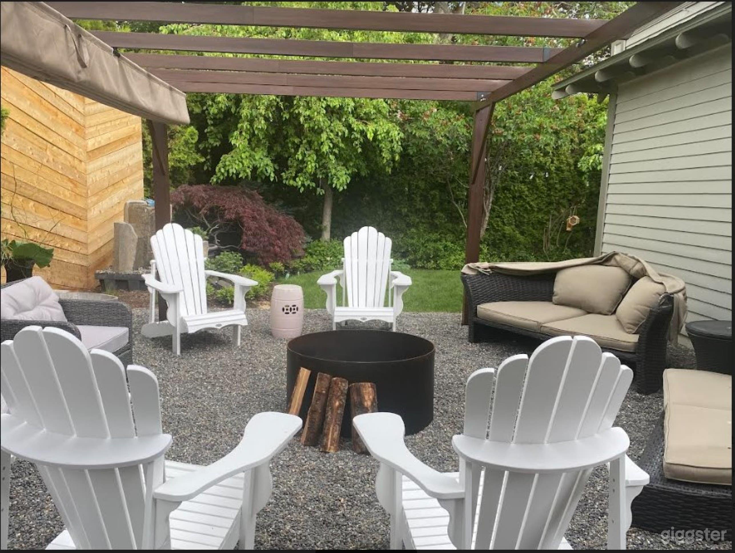 West Lawn And Porch With Firepit Photo 2