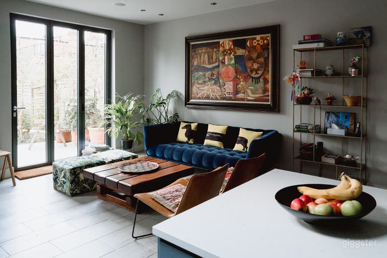  Kitchen open space area focus on island and sitting area. Roche Bobois sofa. 