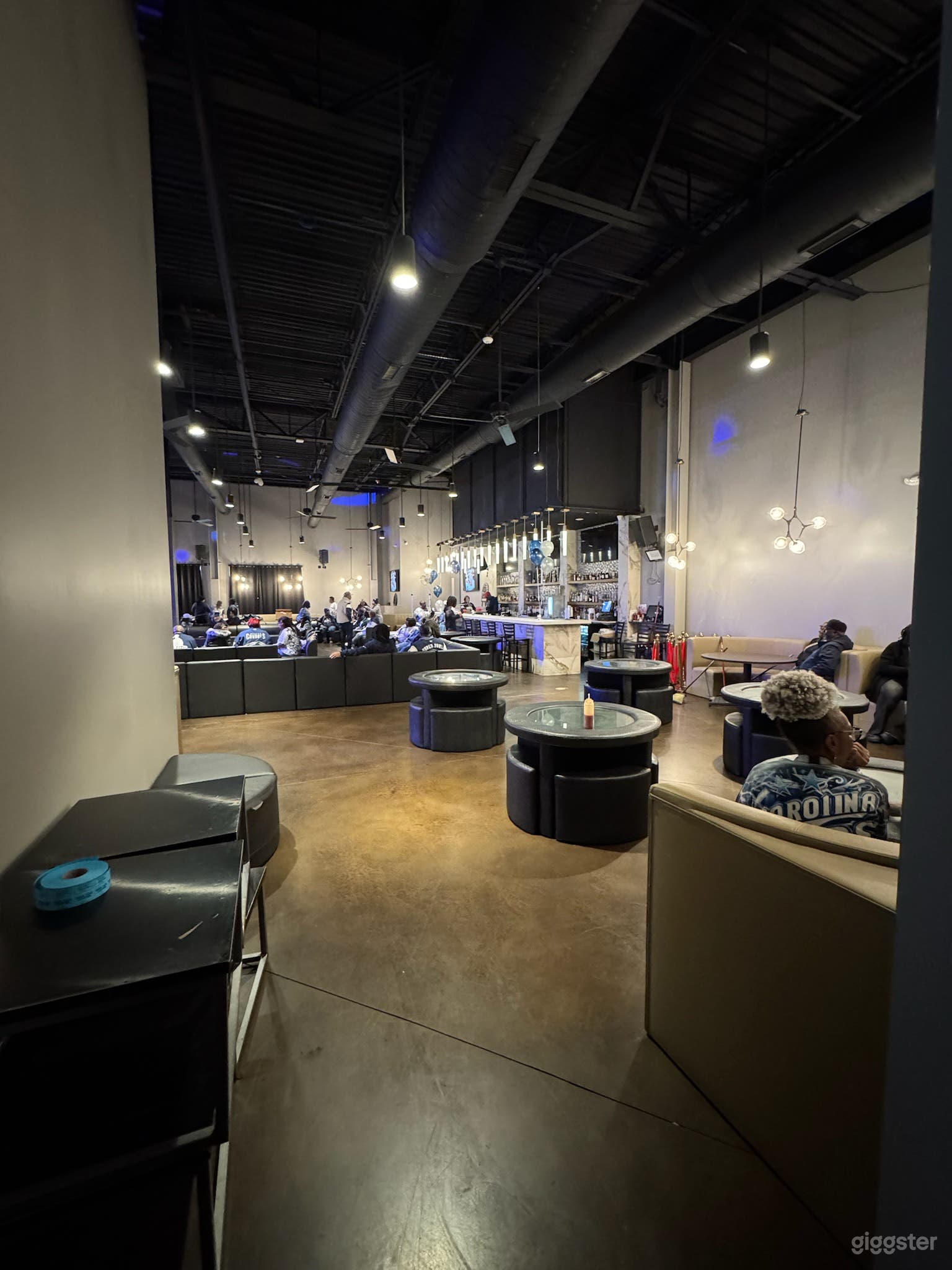 Trendy Bar and Lounge with Stage Photo 2