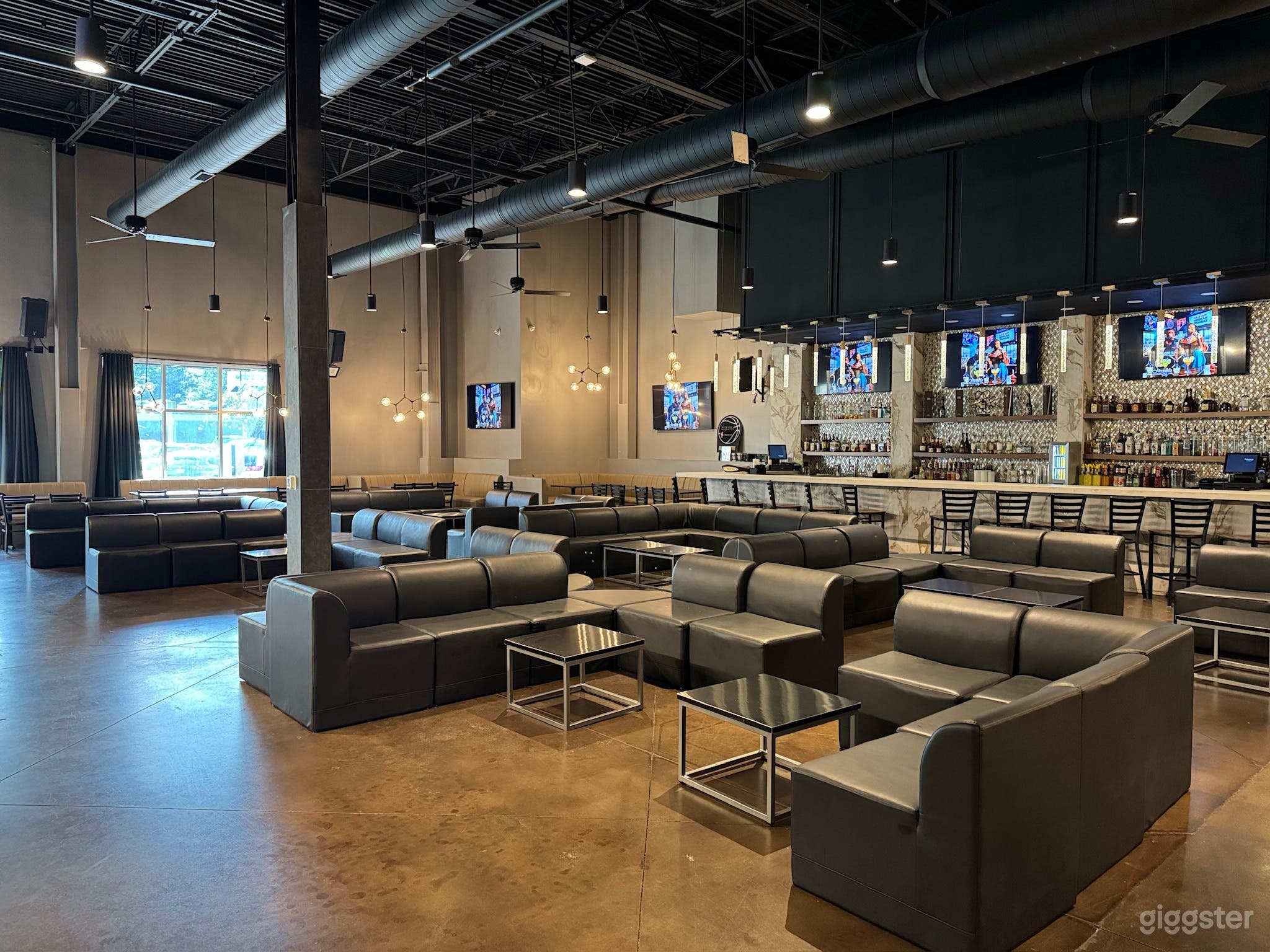 Trendy Bar and Lounge with Stage Photo 1