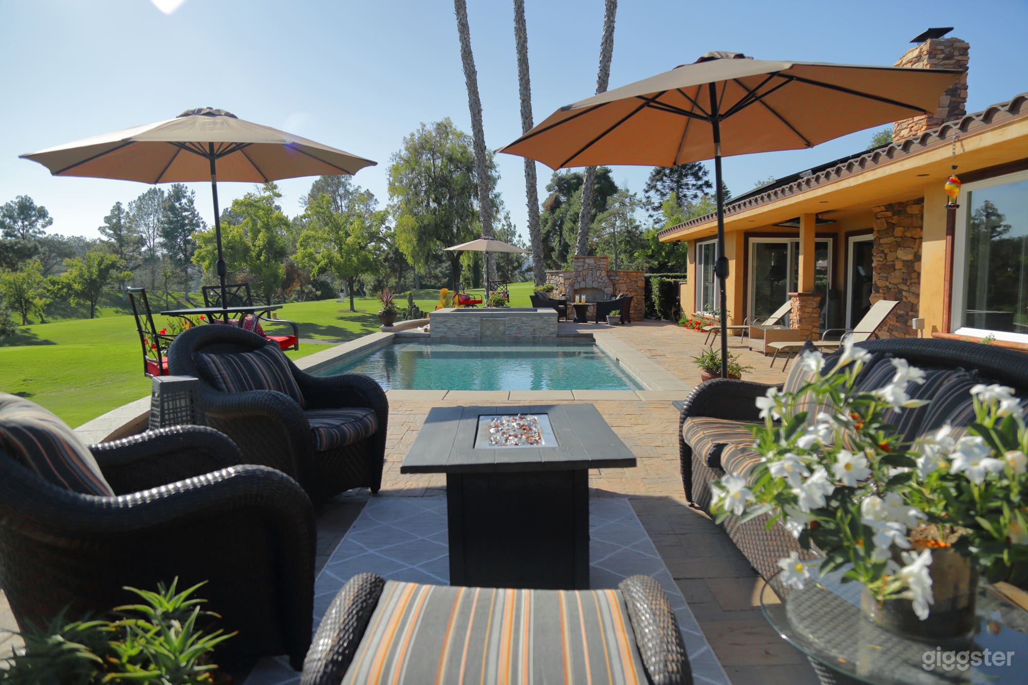 View from fire pit looking over pool