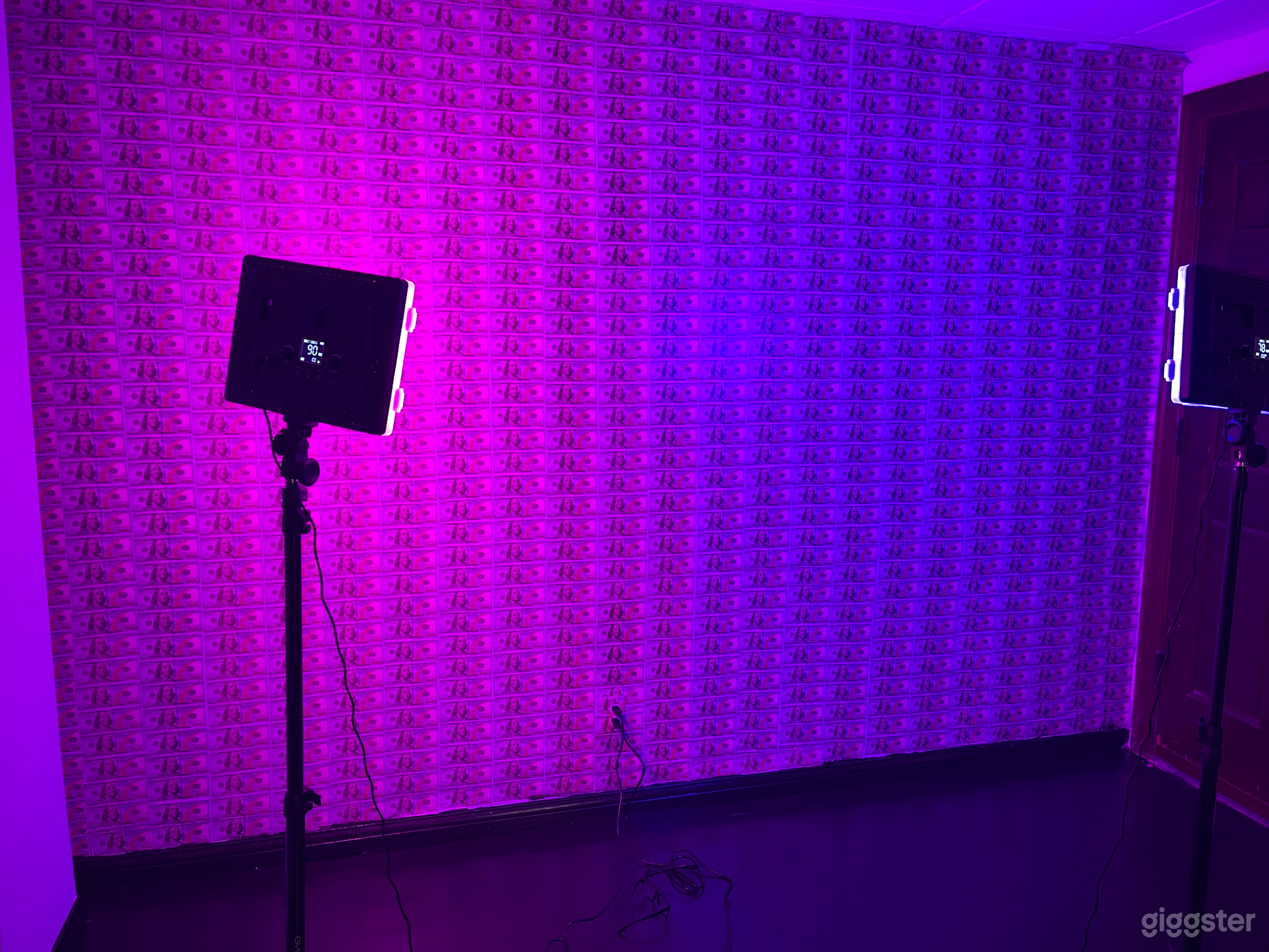 Our favorite place to shoot, against the money wall lit with RGB lighting