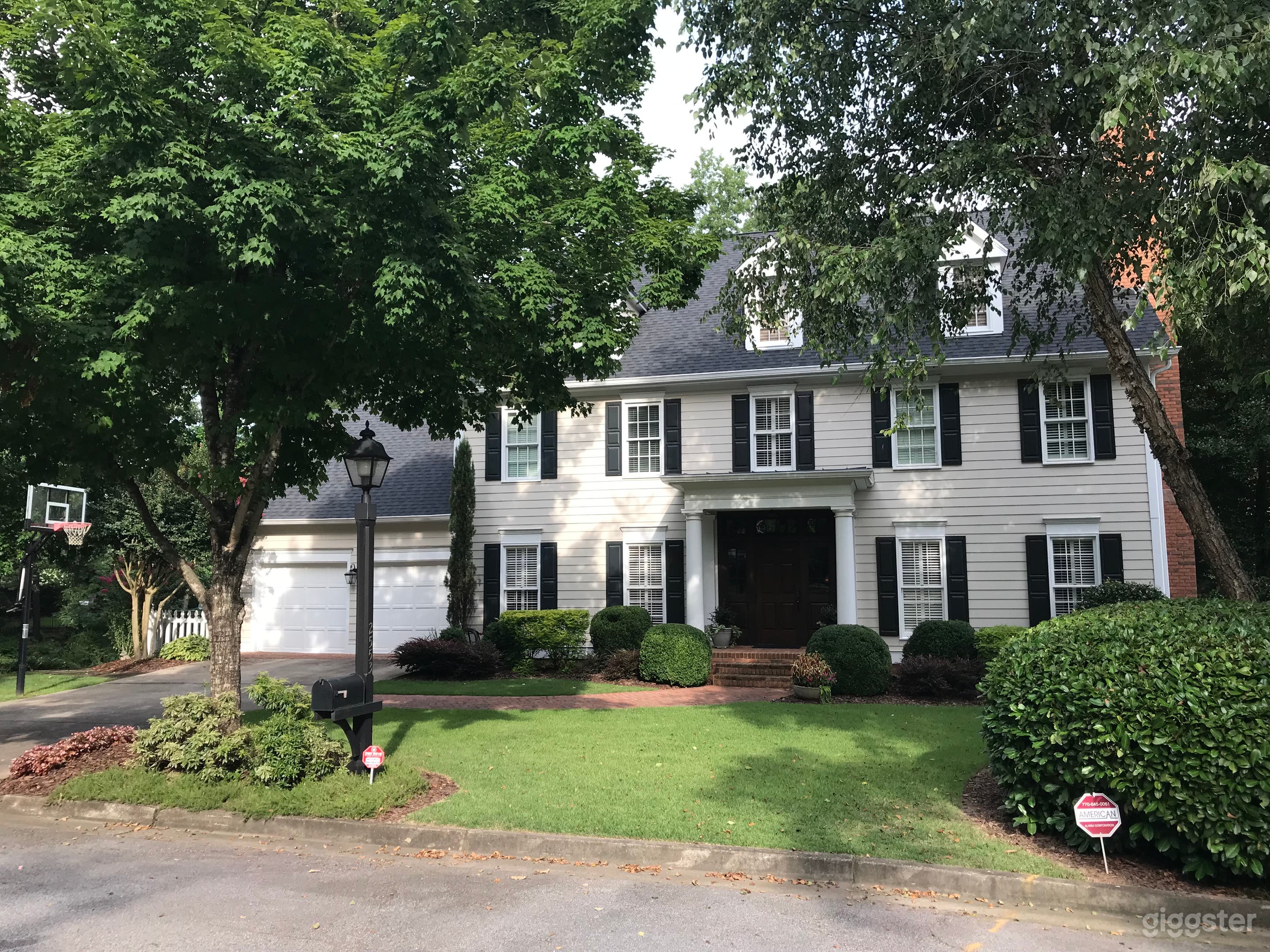 Traditional home front on quiet cul-de-sac with ample parking off of main road