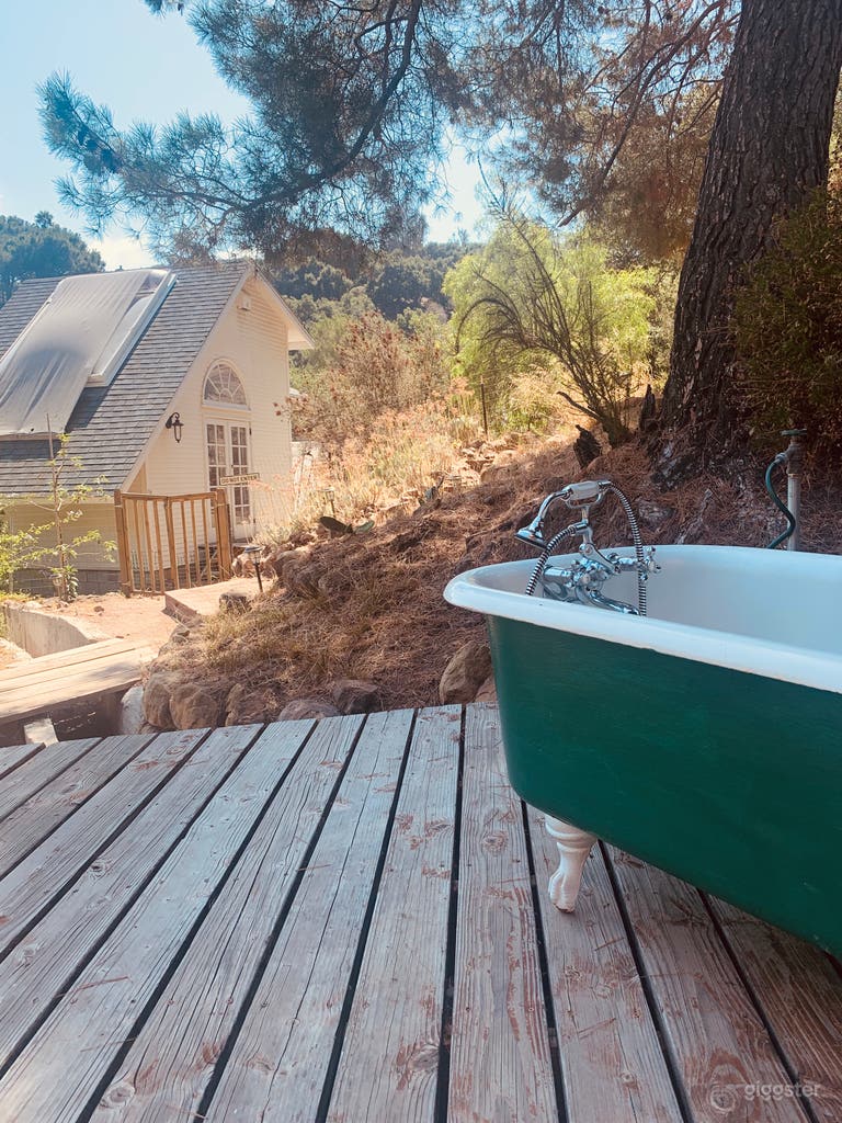  Outdoor bathtub overlooking guest house and Mountain View’s.  