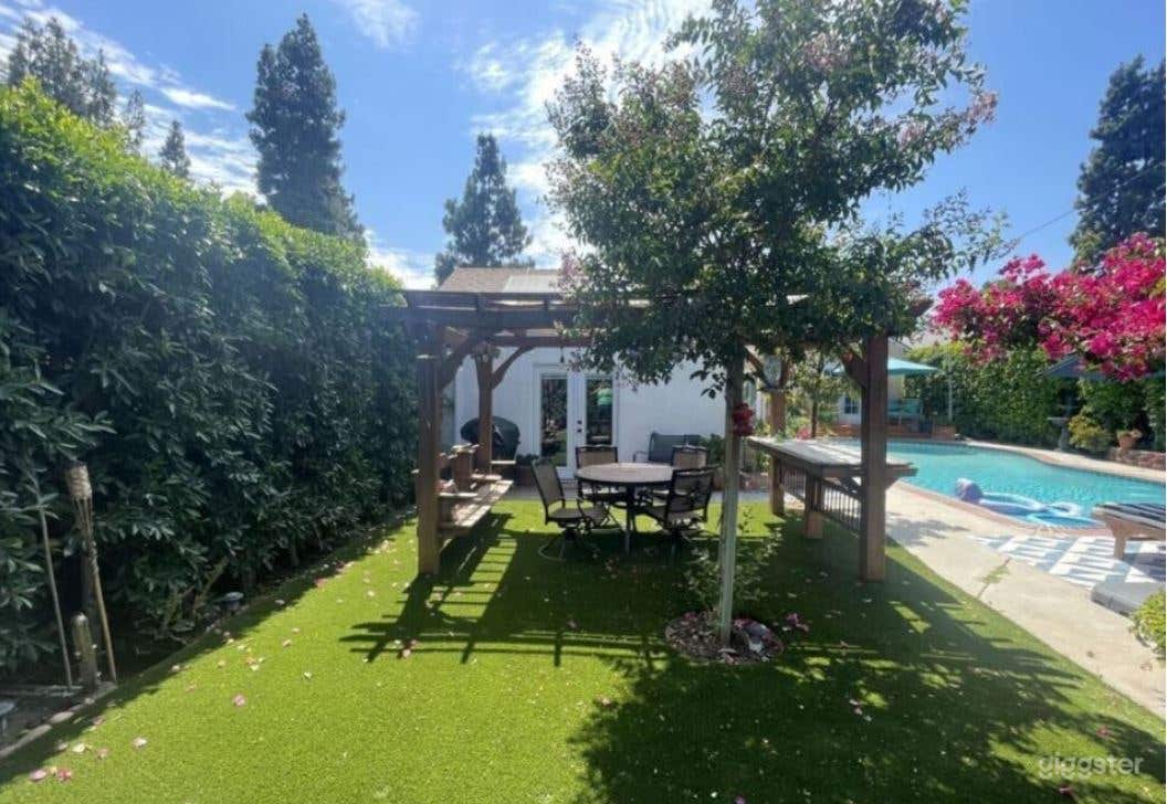 Stunnning Pool with Green Garden Photo 1