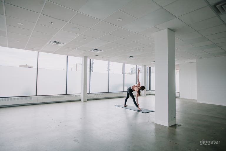  Polished and Professional: The sleek flooring and high ceilings provide a contemporary and professional look, great for commercials or promotional content. 