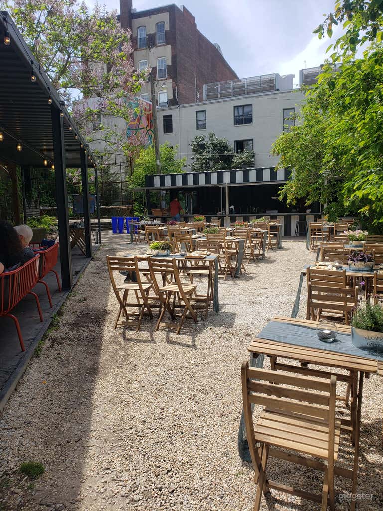  Outdoor beer garden. Full service bar in the striped shipping container. 