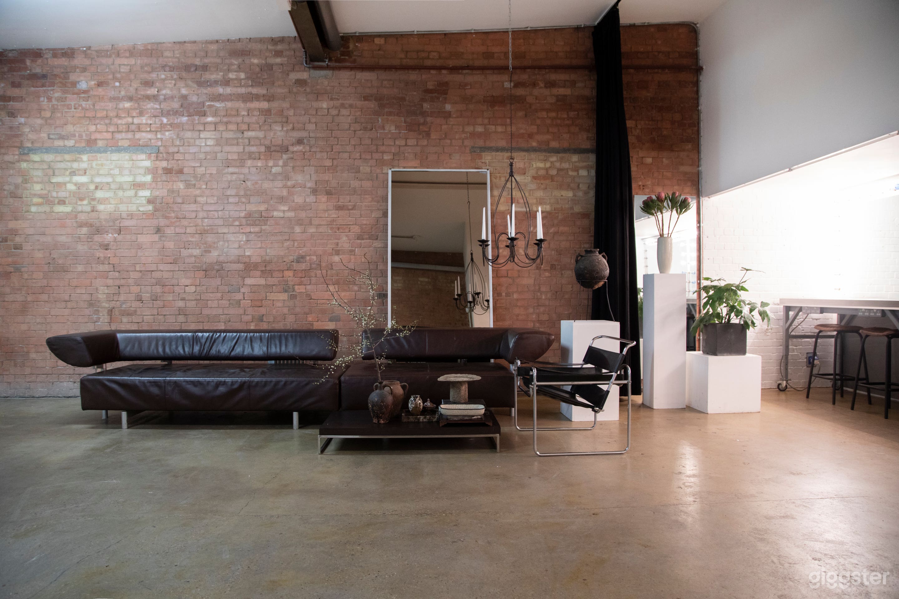 brick wall area / furniture can be moved around or away 