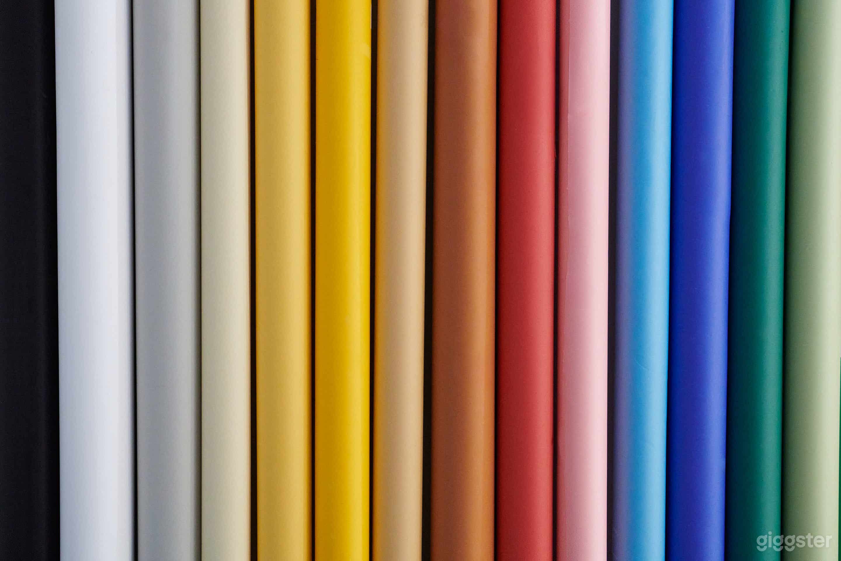 Over 15 different backdrop colours available at $25 per roll if rolled on the floor, and FREE if used only on the wall,