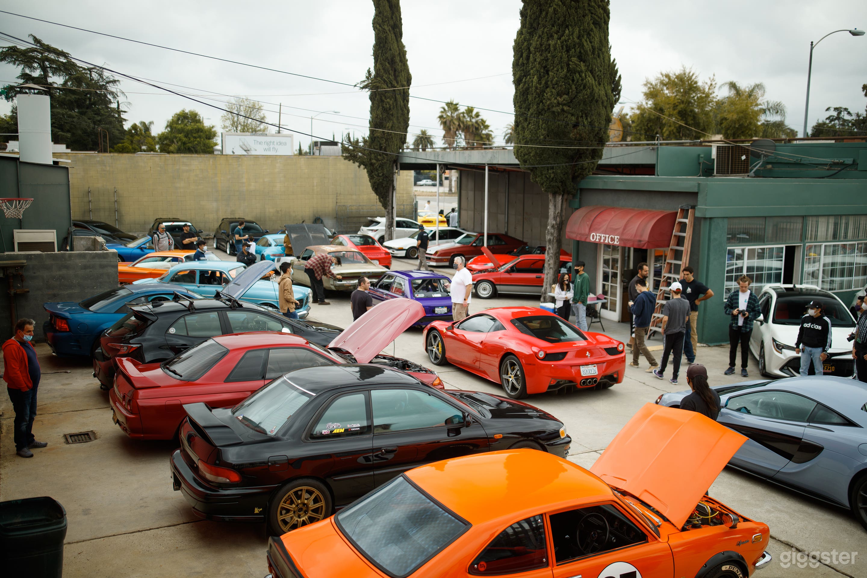 Vintage Industrial Auto Shop &amp; Car Parking Lot Photo 1