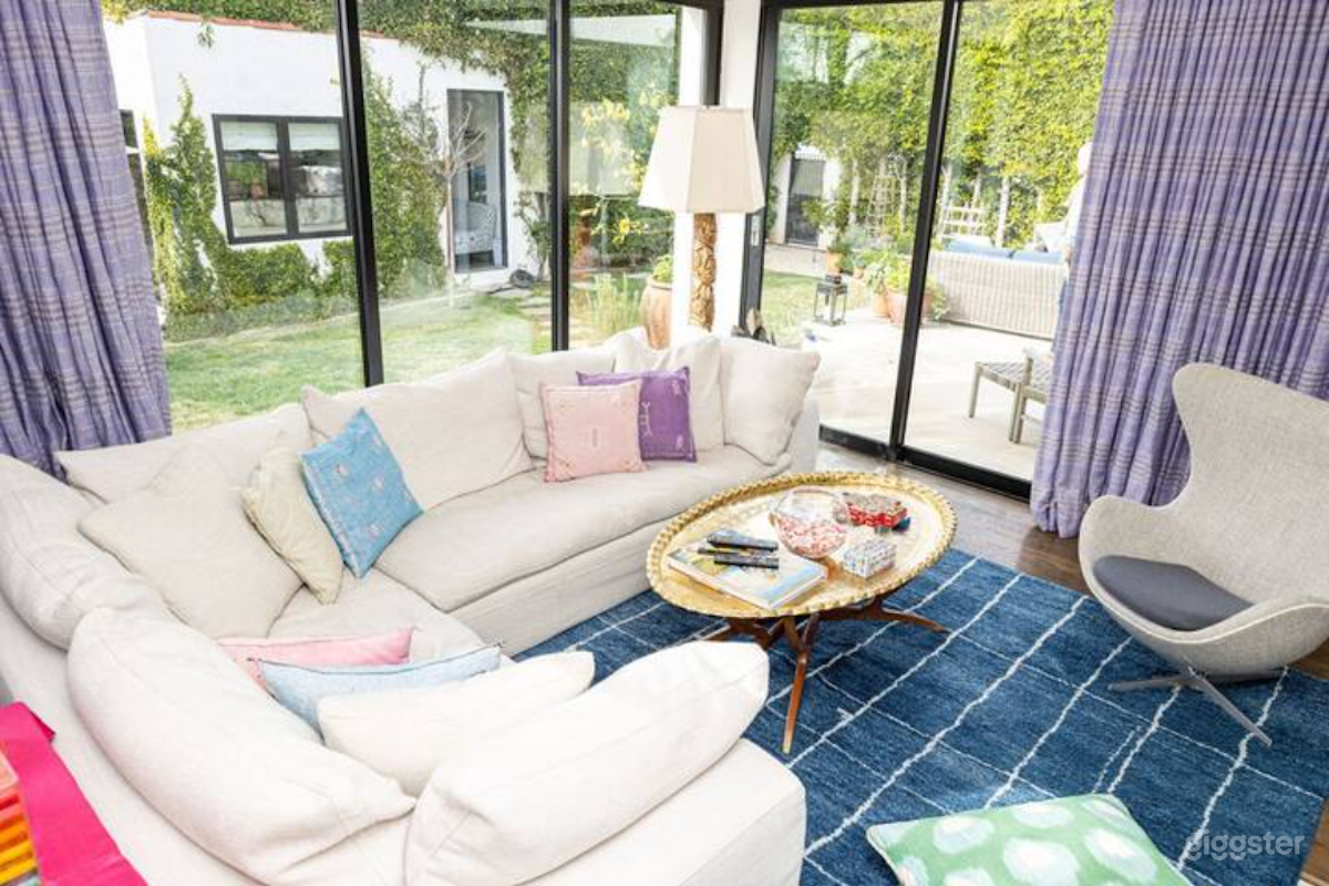 Family/Media Room overlooking the backyard and guest cottage