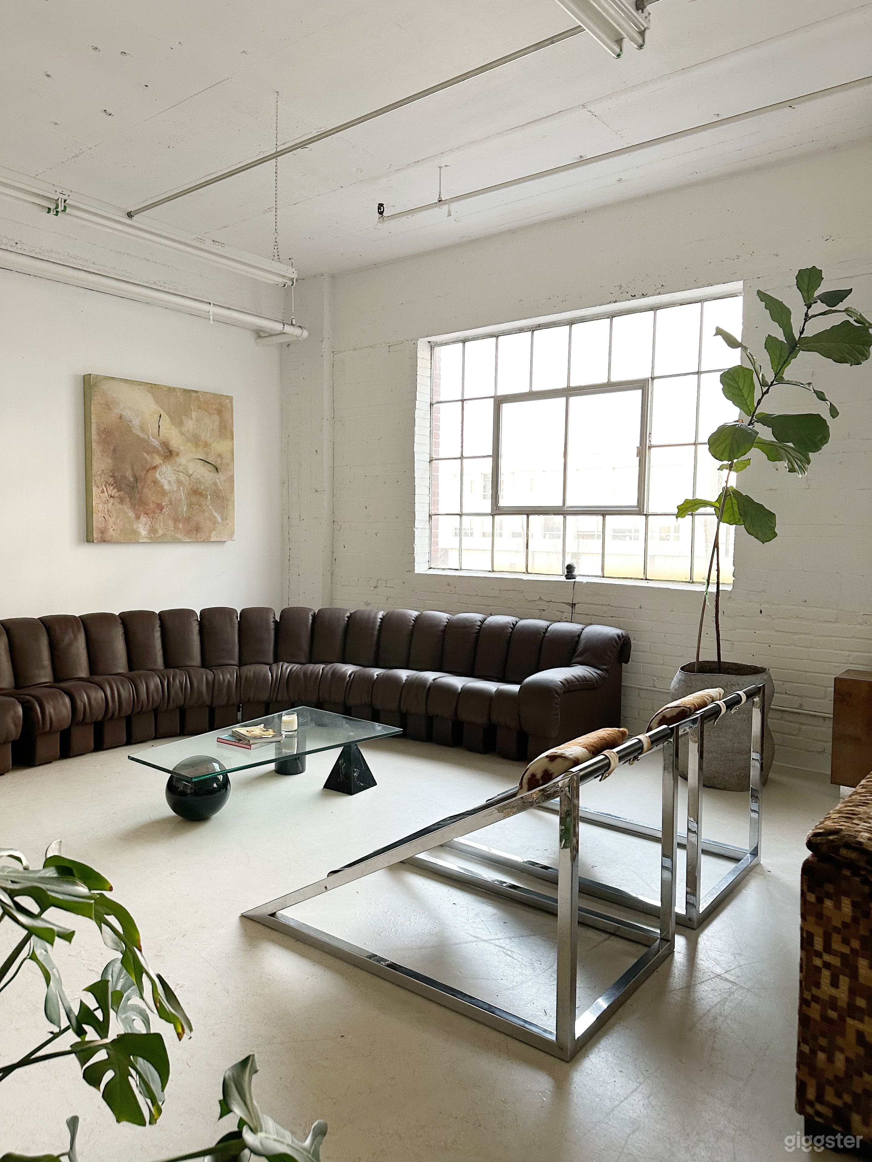 Bright Studio with Designer Furniture and Objects Photo 1