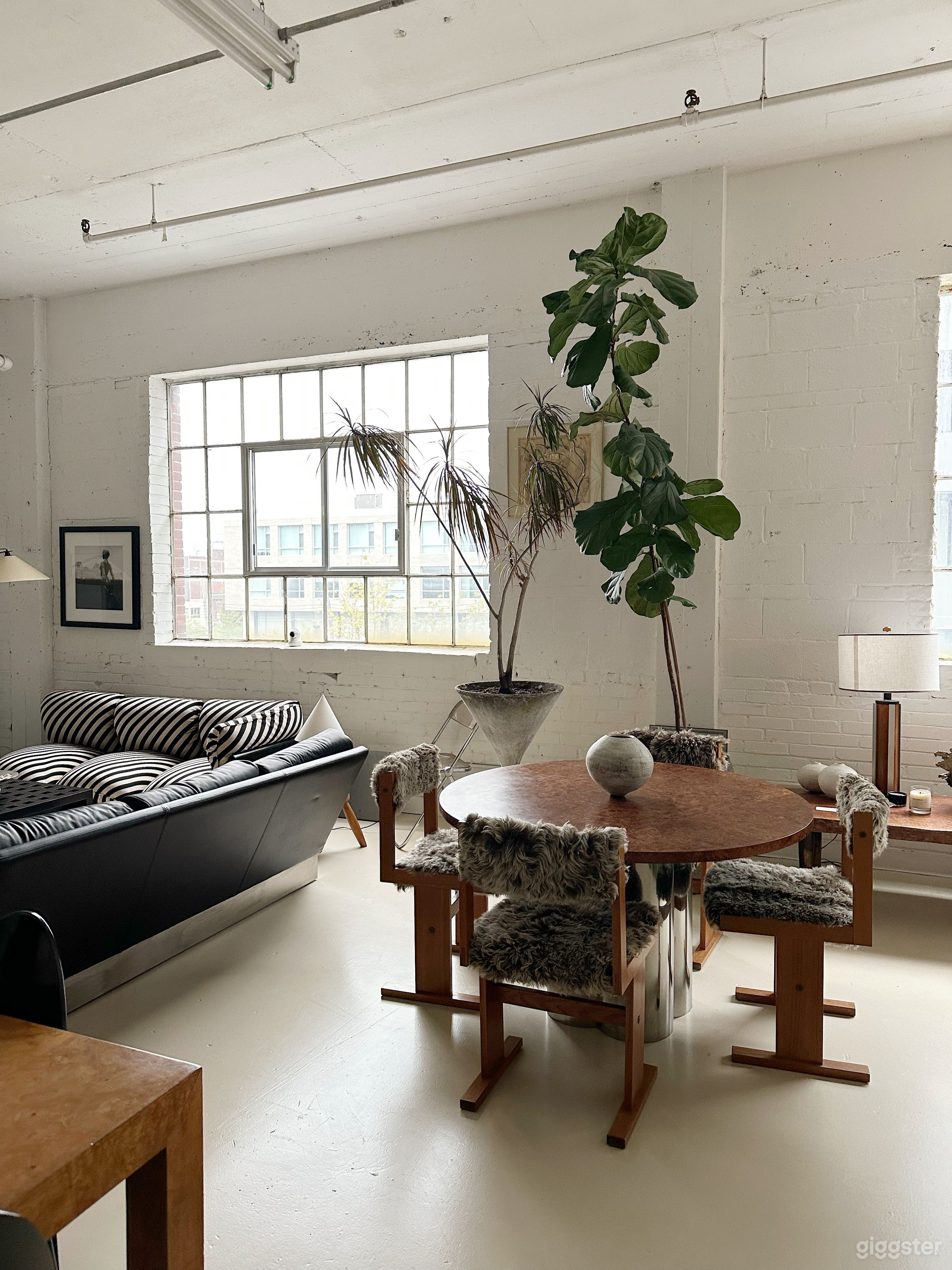 Bright Studio with Designer Furniture and Objects Photo 2