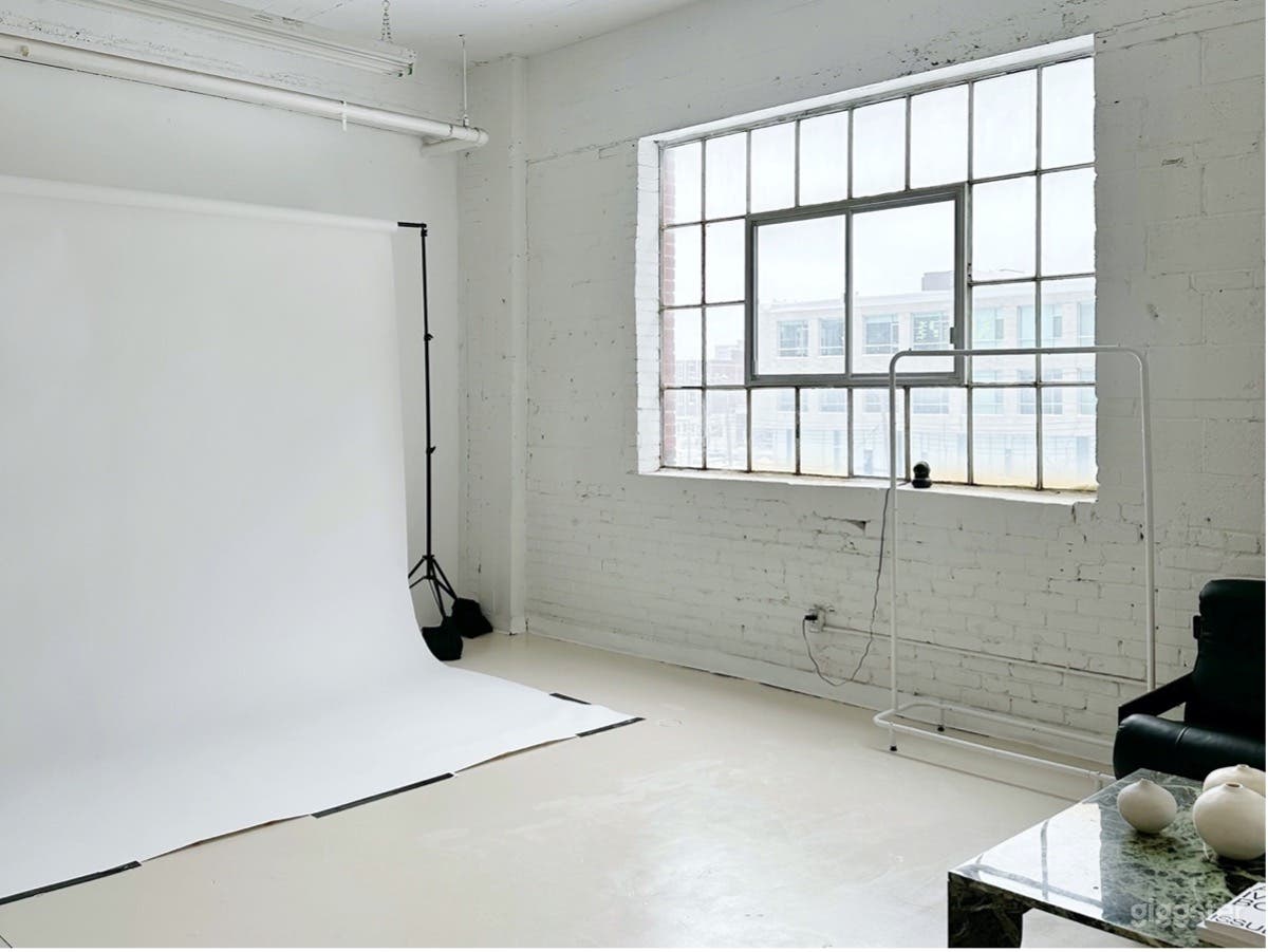 Bright Studio with Designer Furniture and Objects Photo 2