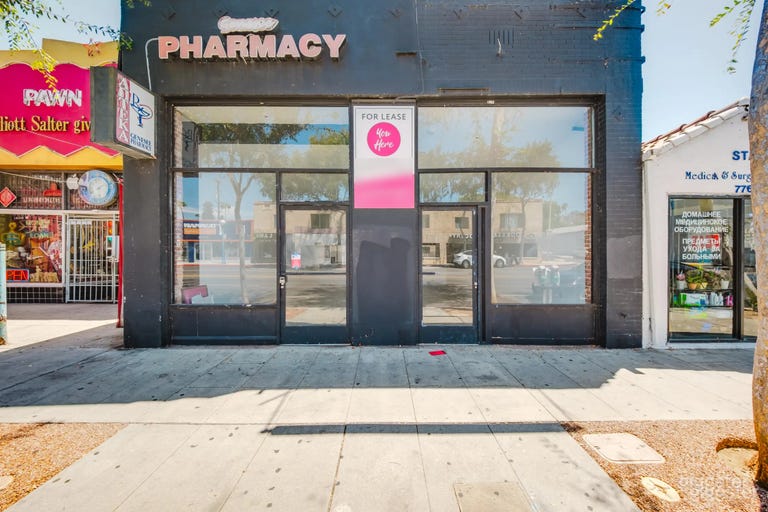  PHARMACY STOREFRONT, RAW CONCRETE & GHOST STREET 
