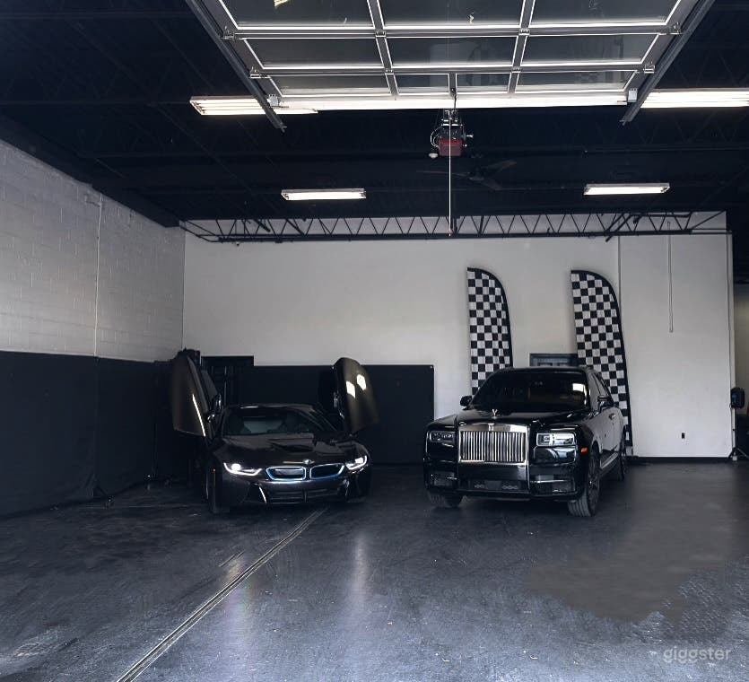 Industrial Space with Luxury Cars Best for Filming &amp; Photoshoots Photo 1