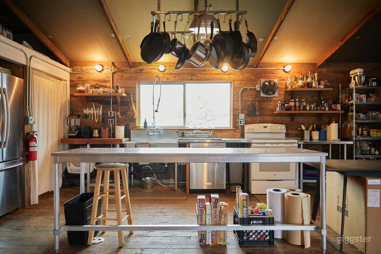  Fully stocked with cooking supplies and utensils, lighting and photography equipment. 