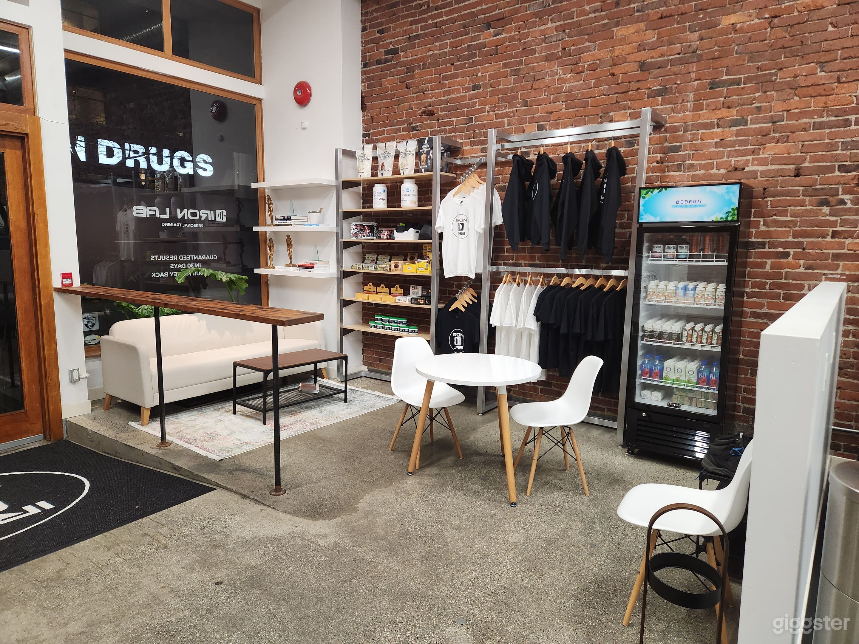 Industrial Fitness Studio with Exposed Brick &amp; High Ceilings Photo 3