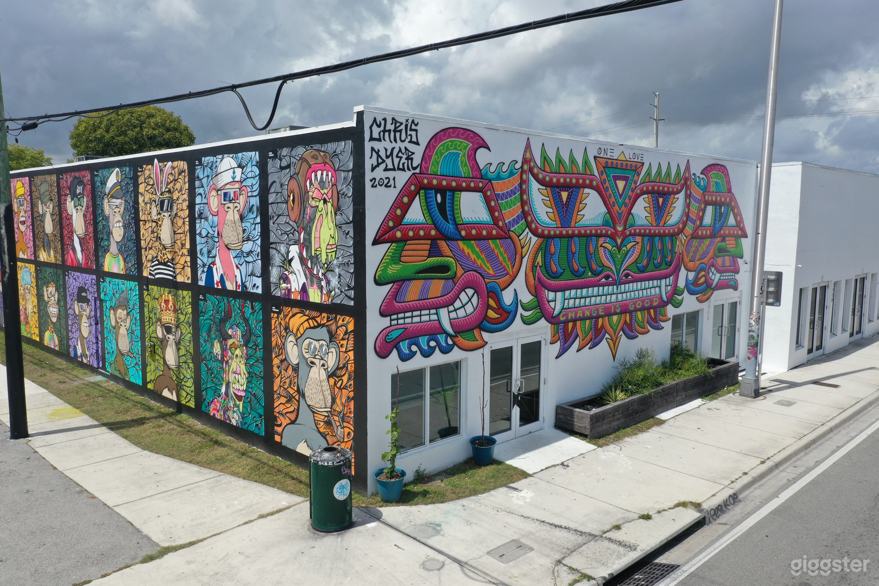 Outside of the building featuring iconic murals