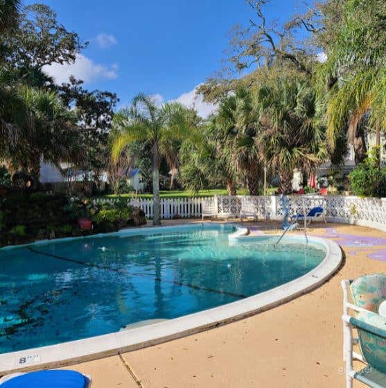 Unque Olympic size 44X40 Heart Shape Pool. Water fall. Large seating and tables. 