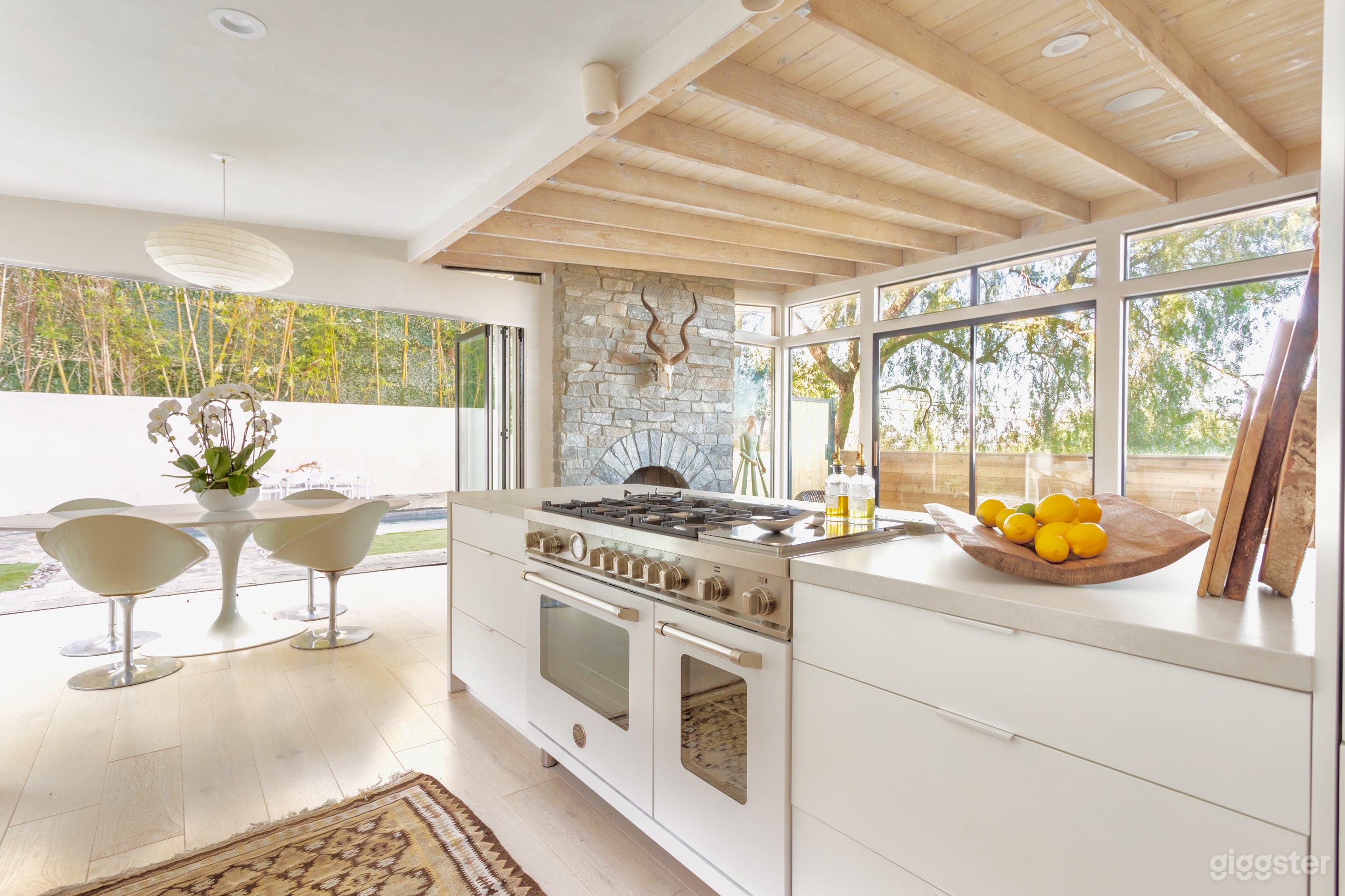 Kitchen, Dining Area, Pool, Folding (4 panel) Glass Door, Fireplace and Sliding Door.