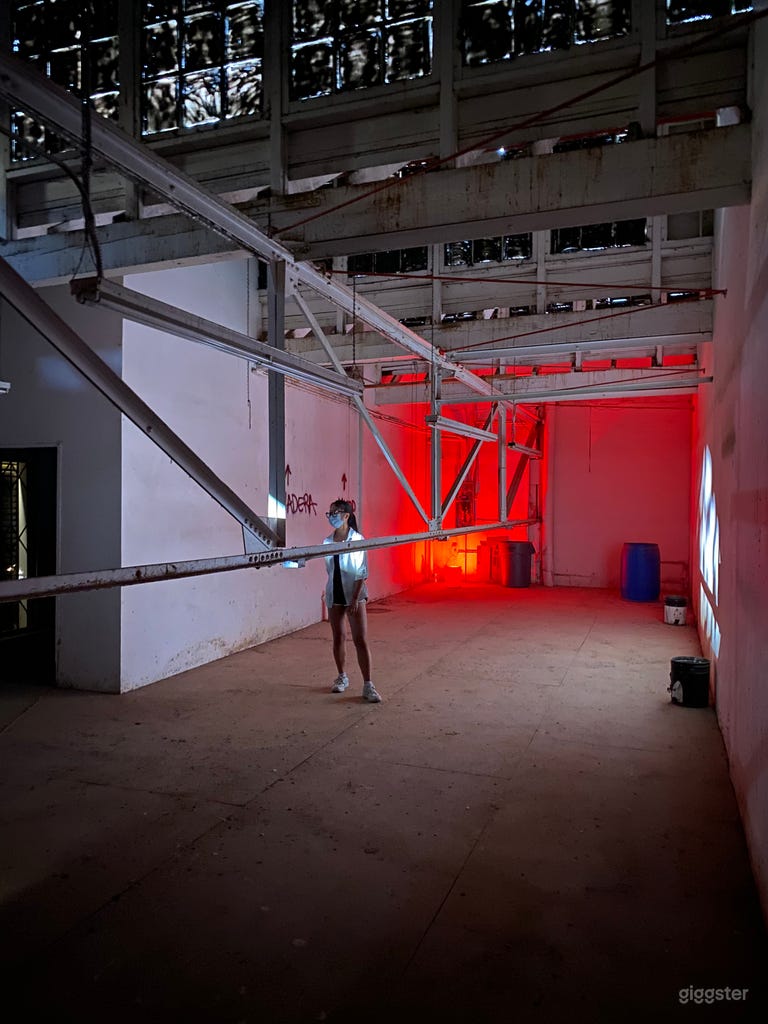  3000 Sqft raw industrial room with sawtooth windows 