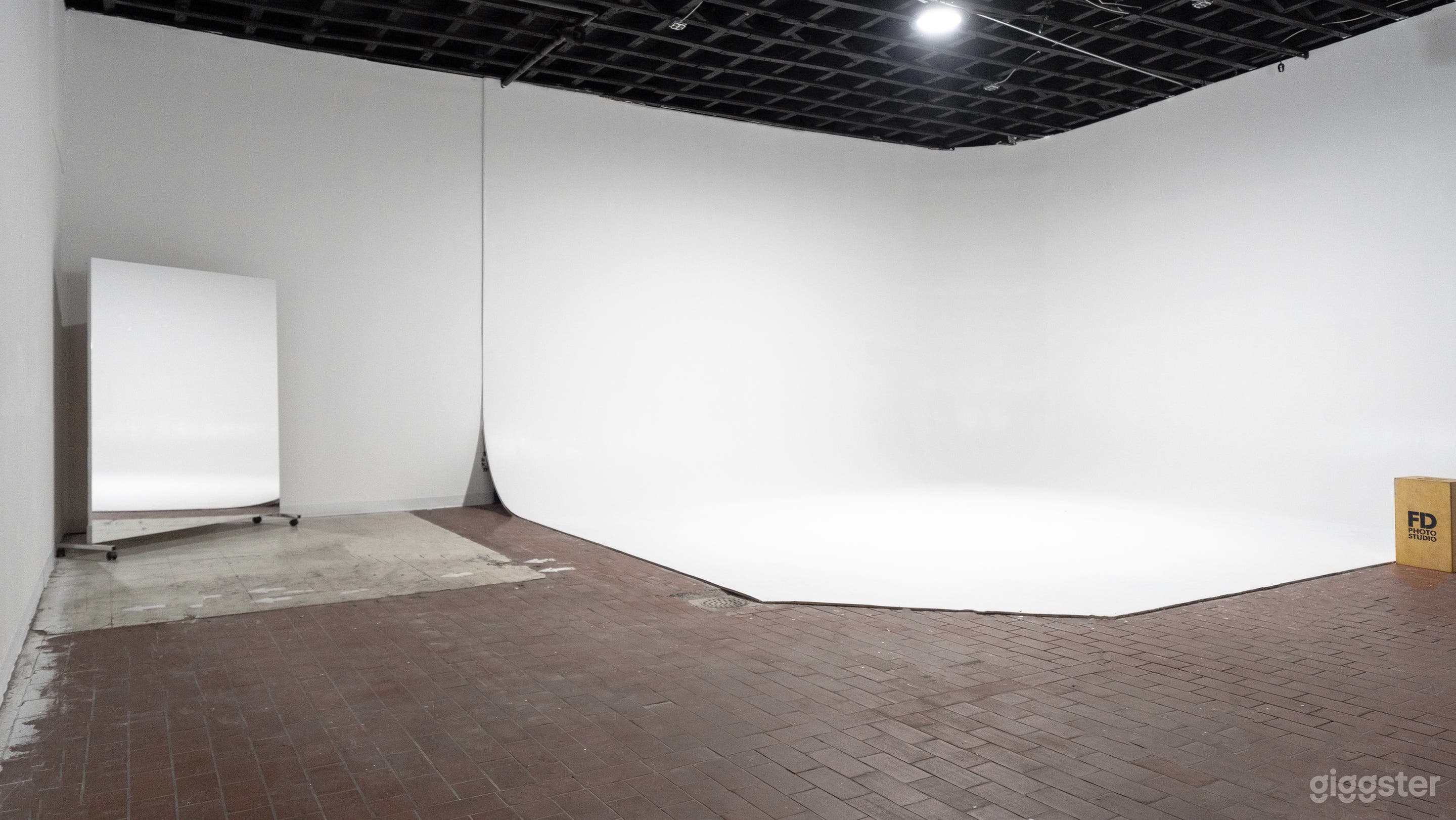 Blackout Photo Studio with Large corner Cyc Wall Photo 2