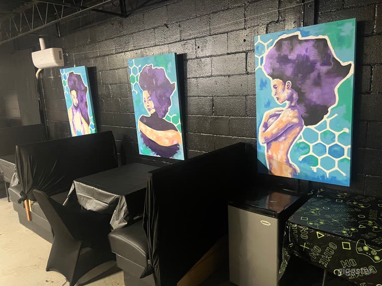  South wall and seating with mini fridge.  