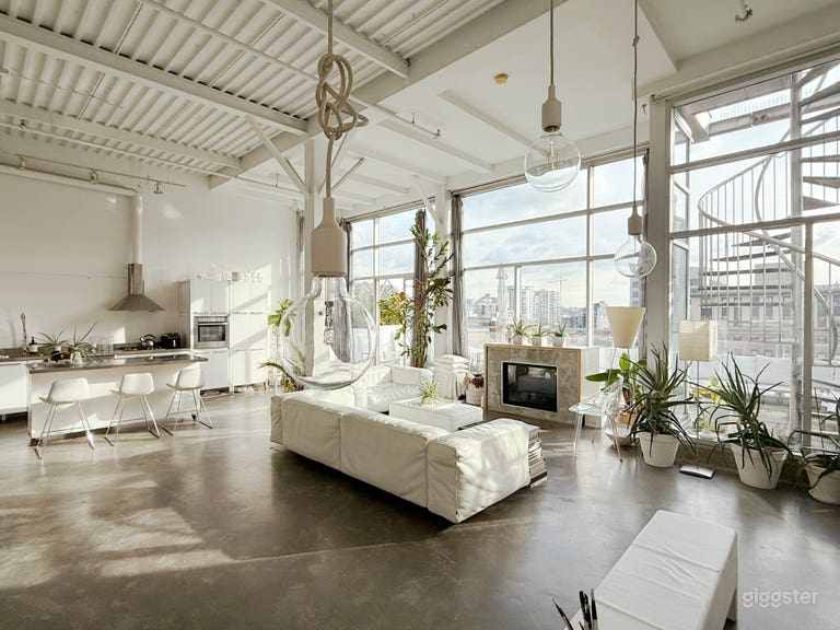  White Loft with open concept, deck and fireplace. 