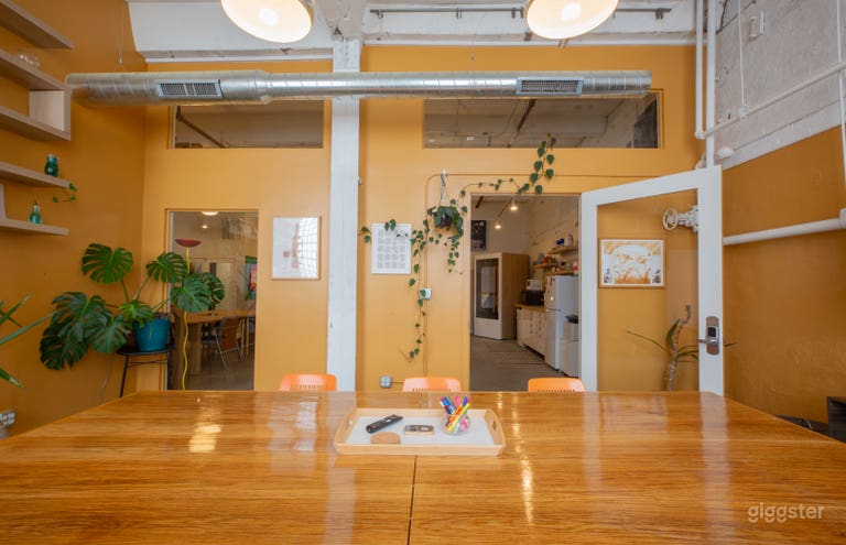  Lush live greenery fills the room, completing the space. 