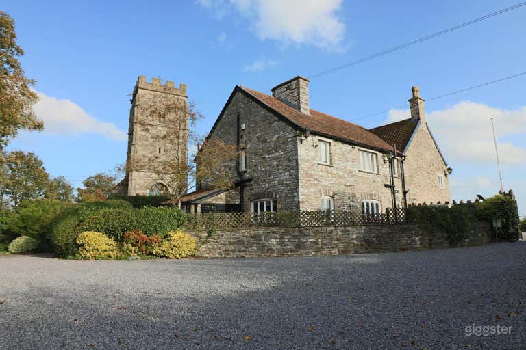  North West aspect showing extension. The 12th Century church tower is to the left. 