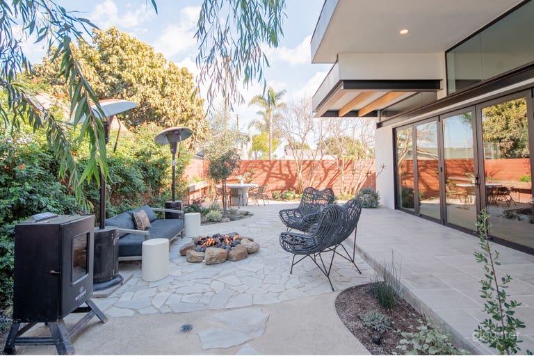  Firepit with dining table in the background 