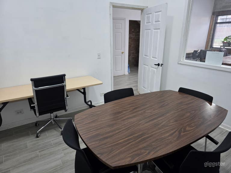  This is a private conference room that seats up to 6 people.  