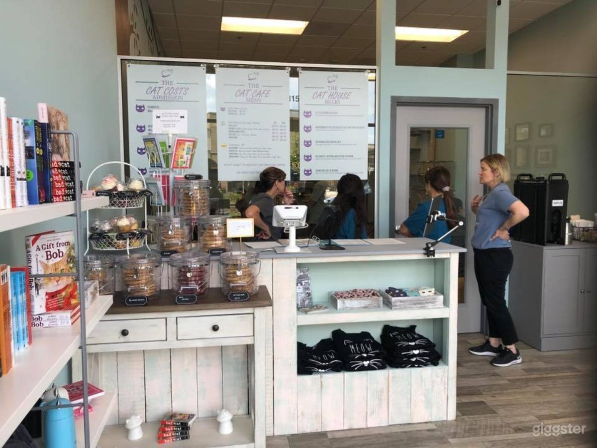 Reception area with two 4-top tables for optional space or food set up