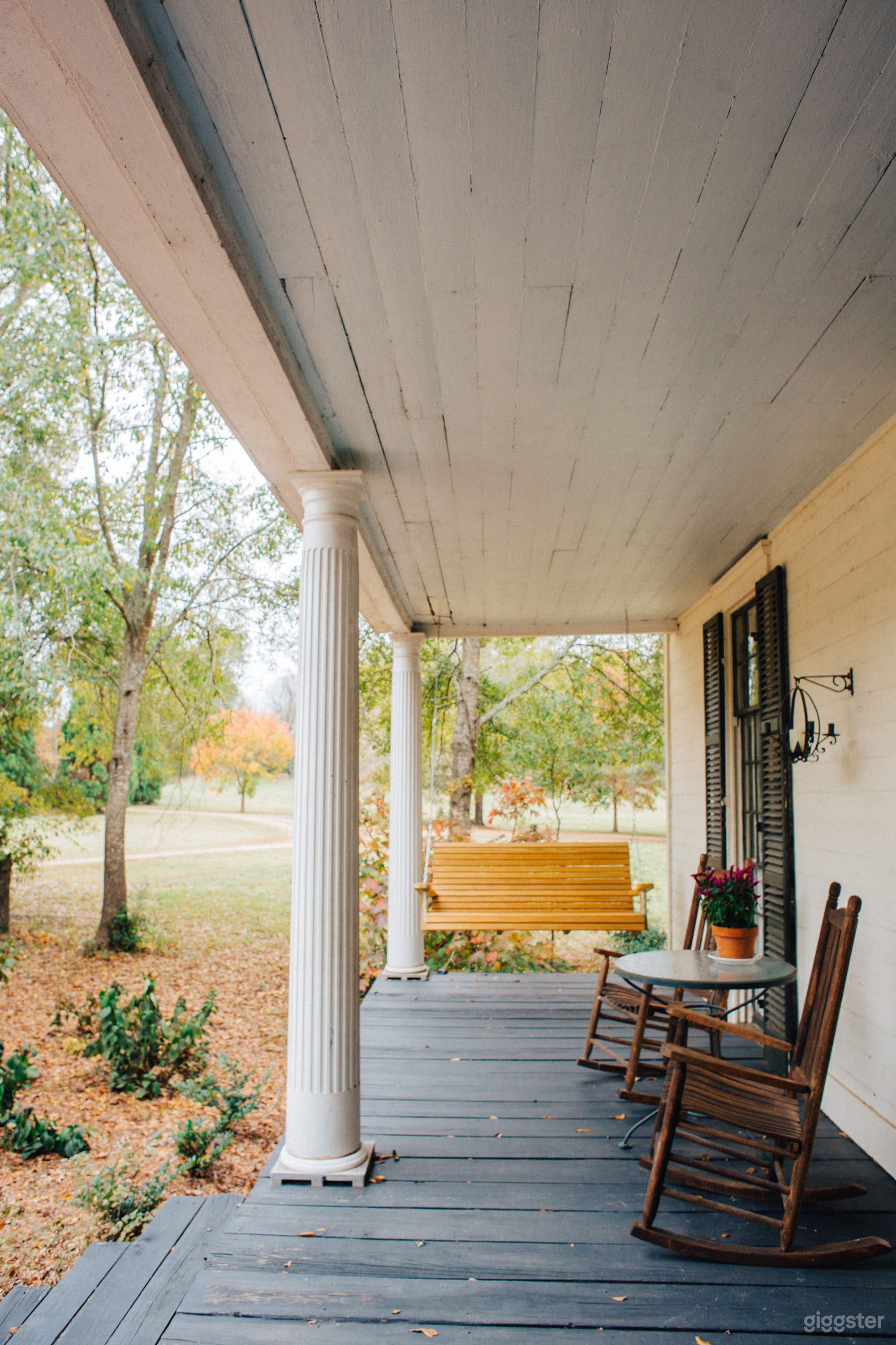 front porch, porch swing, garden in front