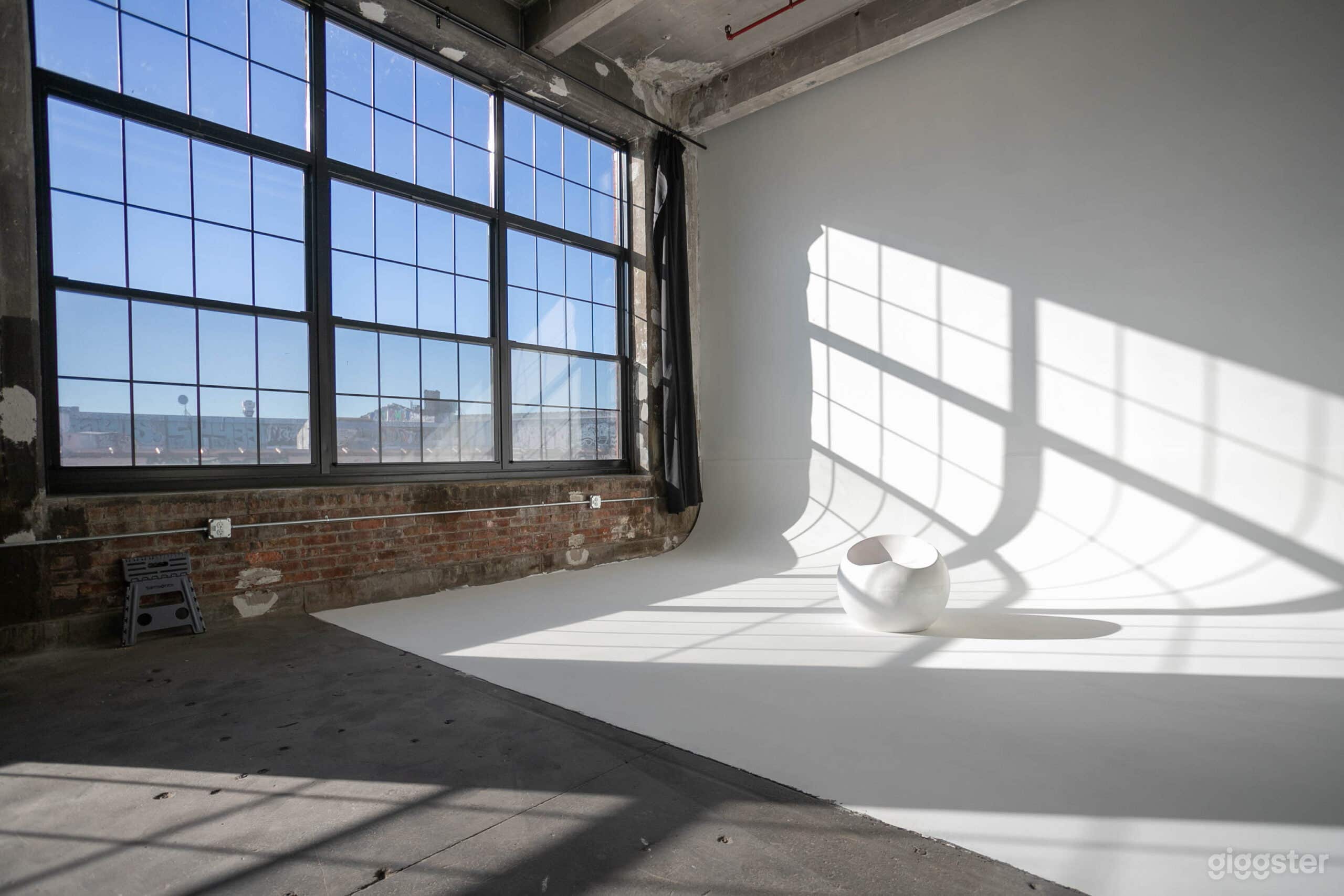 Bright Sunny Cyclorama Studio Photo 1