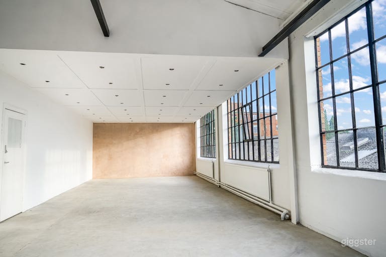  Bright Industrial Photo Studio with Natural Light & Minimalist Aesthetic 