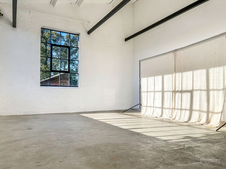  Bright Industrial Photo Studio with Natural Light & Minimalist Aesthetic 