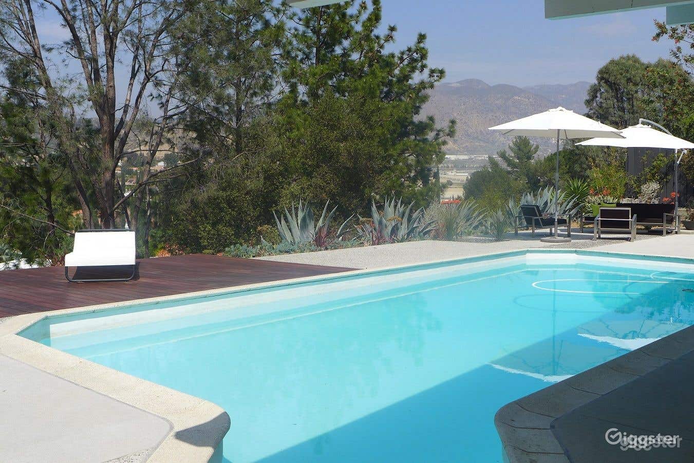 Fascinating Pool Area with Stunning Views of the Mountains Photo 2