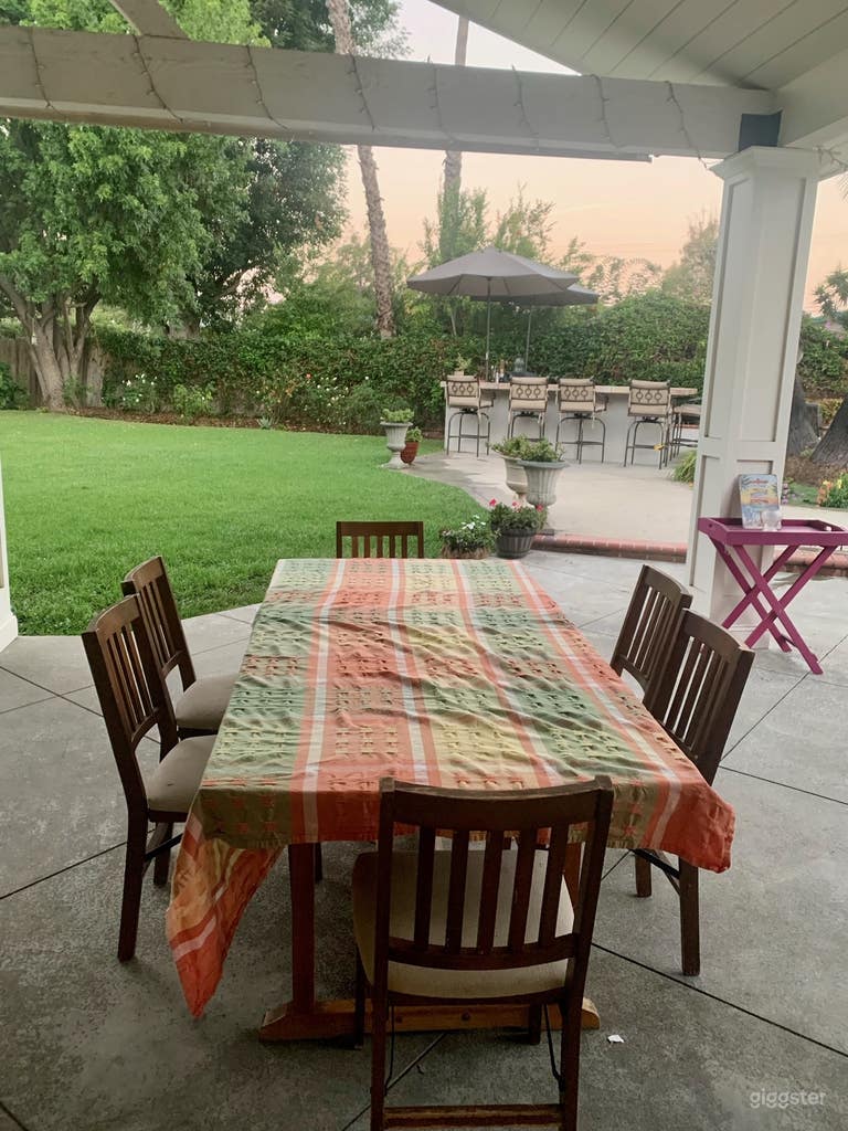  Shaded table and chairs with covering, fans and heaters 