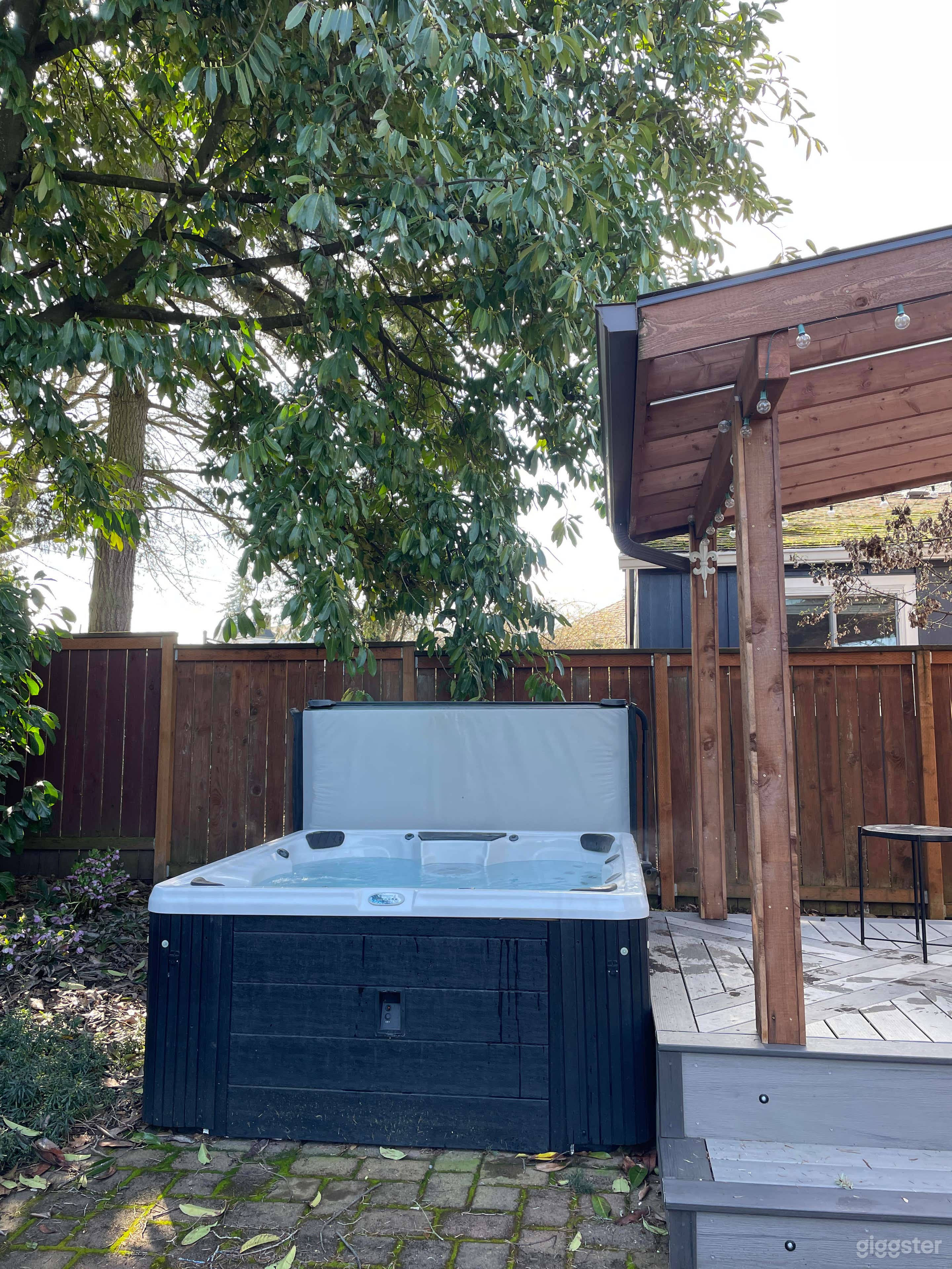 Charming Backyard with Hot Tub and Fire Pit Photo 4