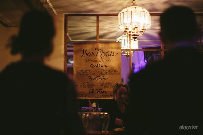  Sash windows provide depth to the space between lounging areas. 