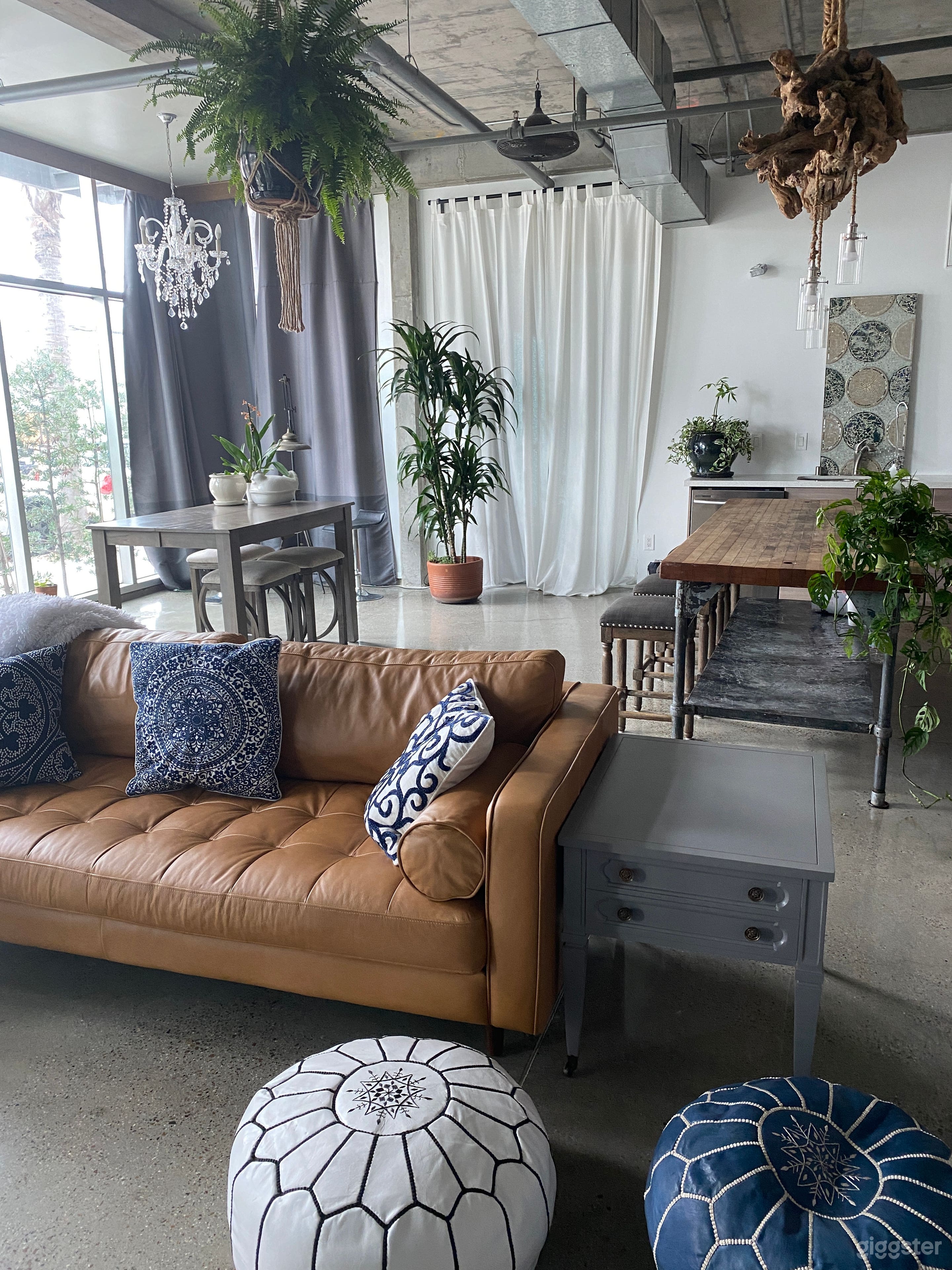 Loft house with two rooms off the main room.