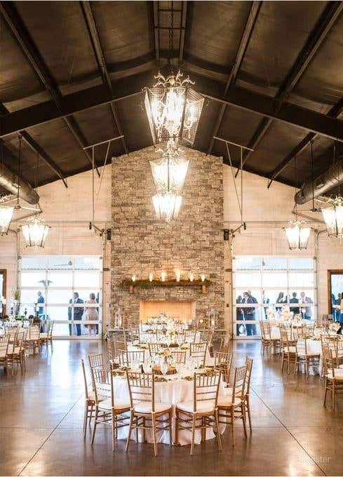 Rustic Venue with a Picturesque Meadow Backdrop  Photo 1