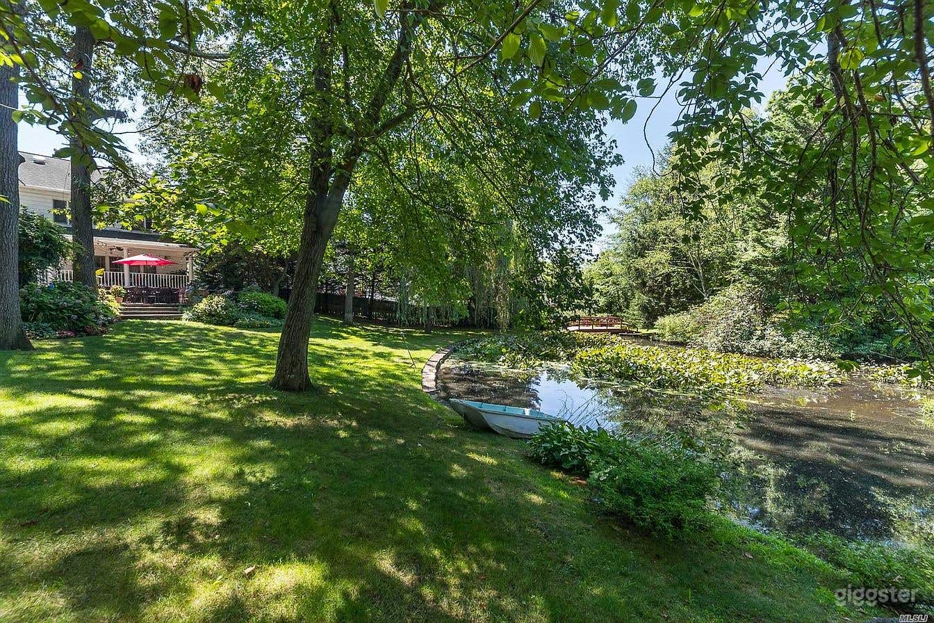 Beautiful Backyard with Breathtaking Lake Photo 3