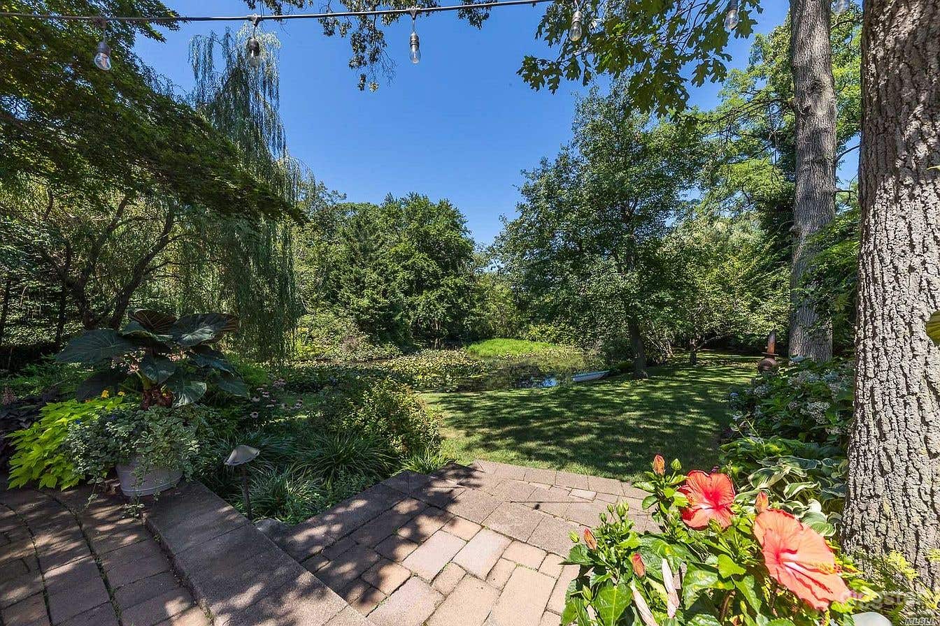 Beautiful Backyard with Breathtaking Lake Photo 2