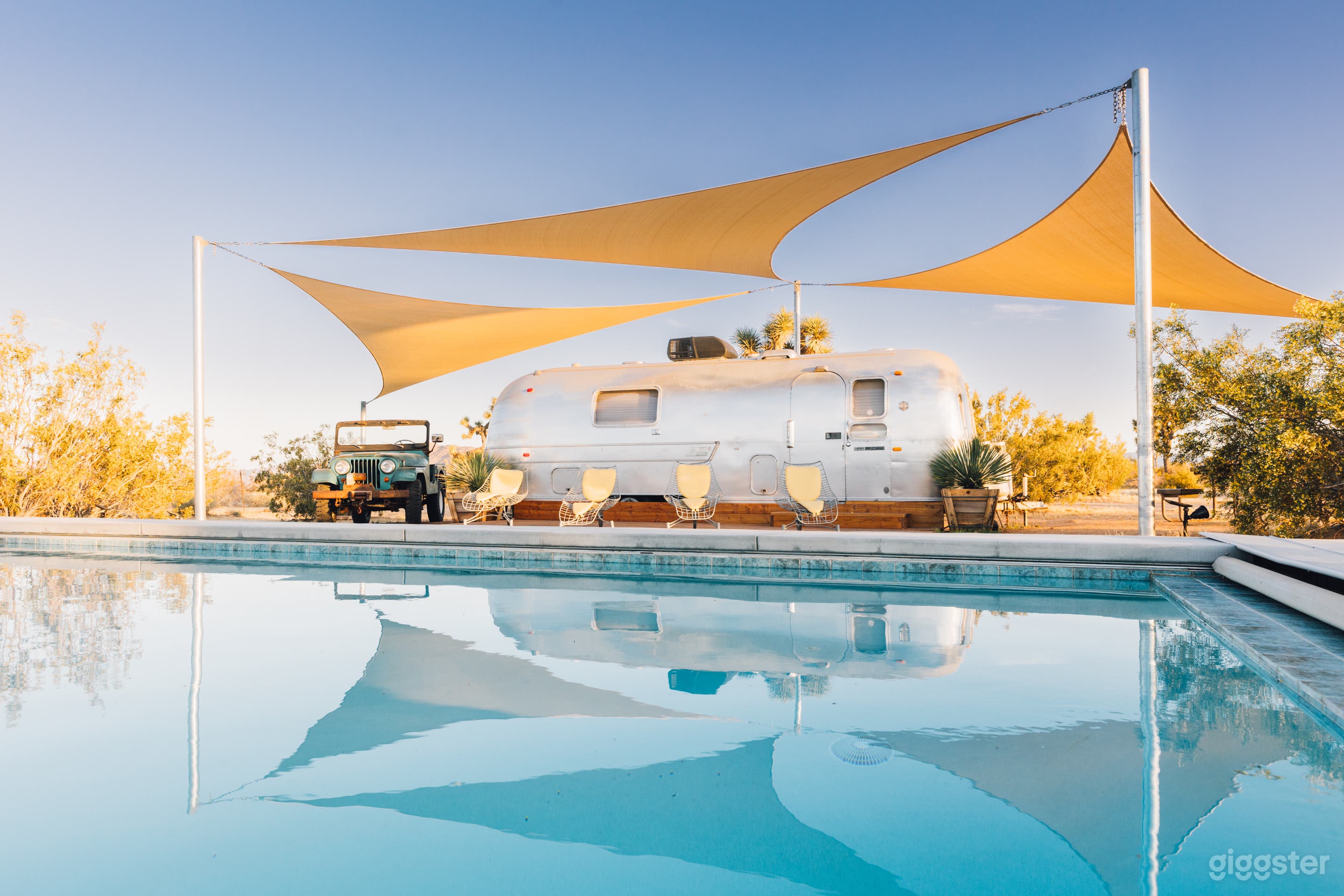New Pool with 60s vintage lounge chairs 