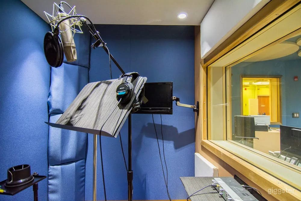 Studio B: Spacious acoustically treated studio space. (Professional audio/recording equipment, Client chairs/sofas, Audio engineer station)