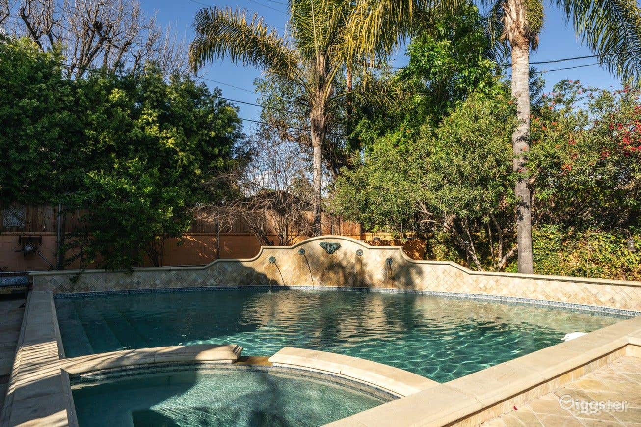 In-ground pool in a charming backyard patio Photo 2