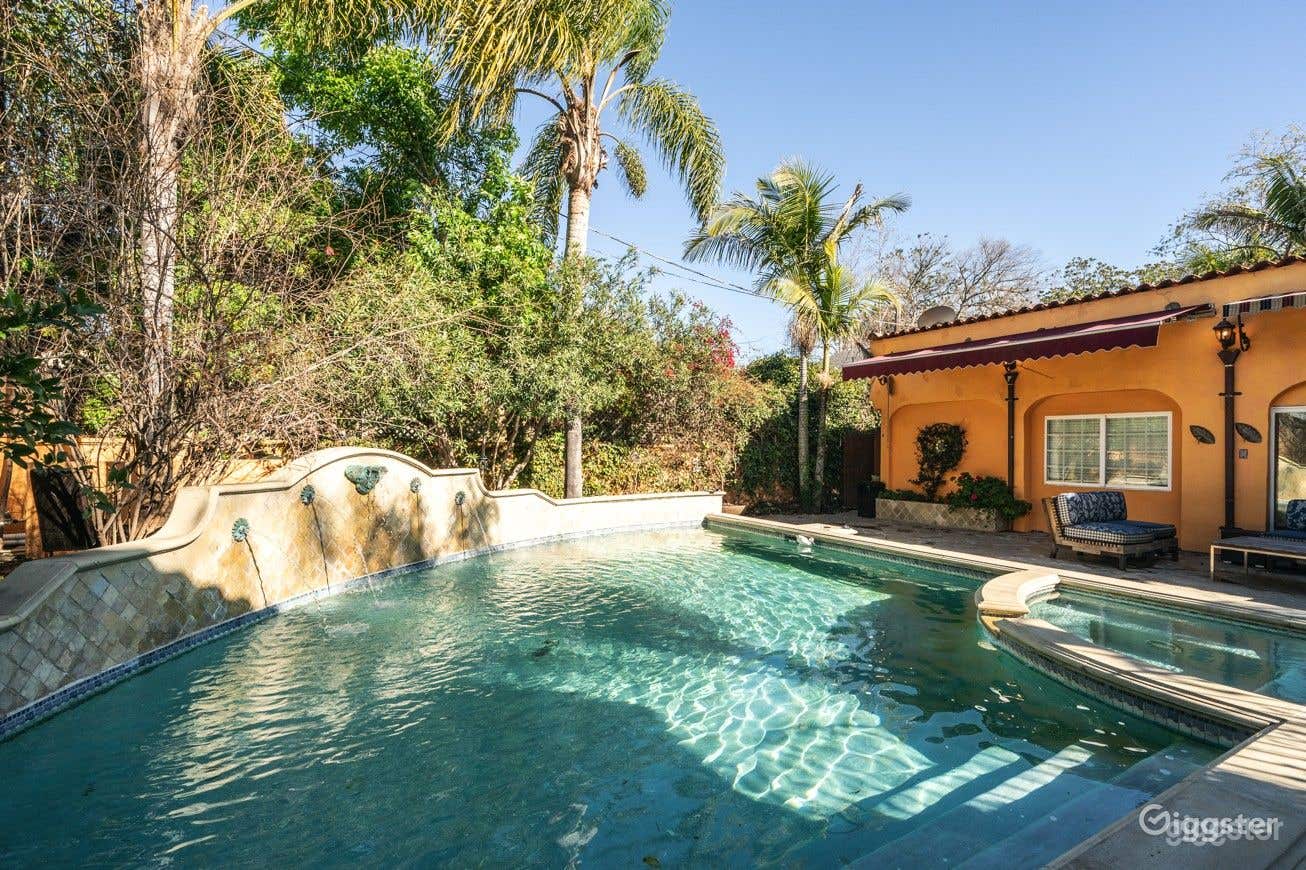 In-ground pool in a charming backyard patio Photo 3